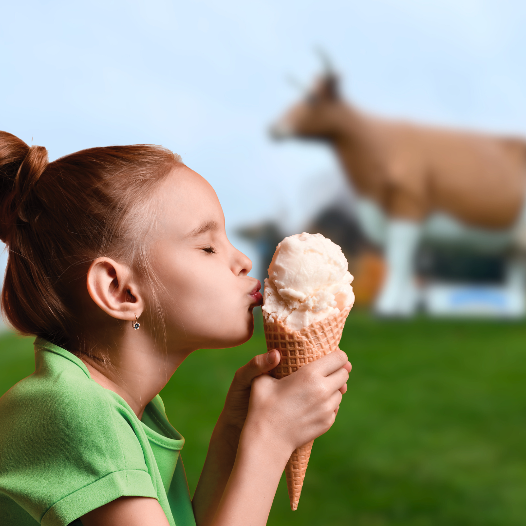 Girl licking ice cream cone